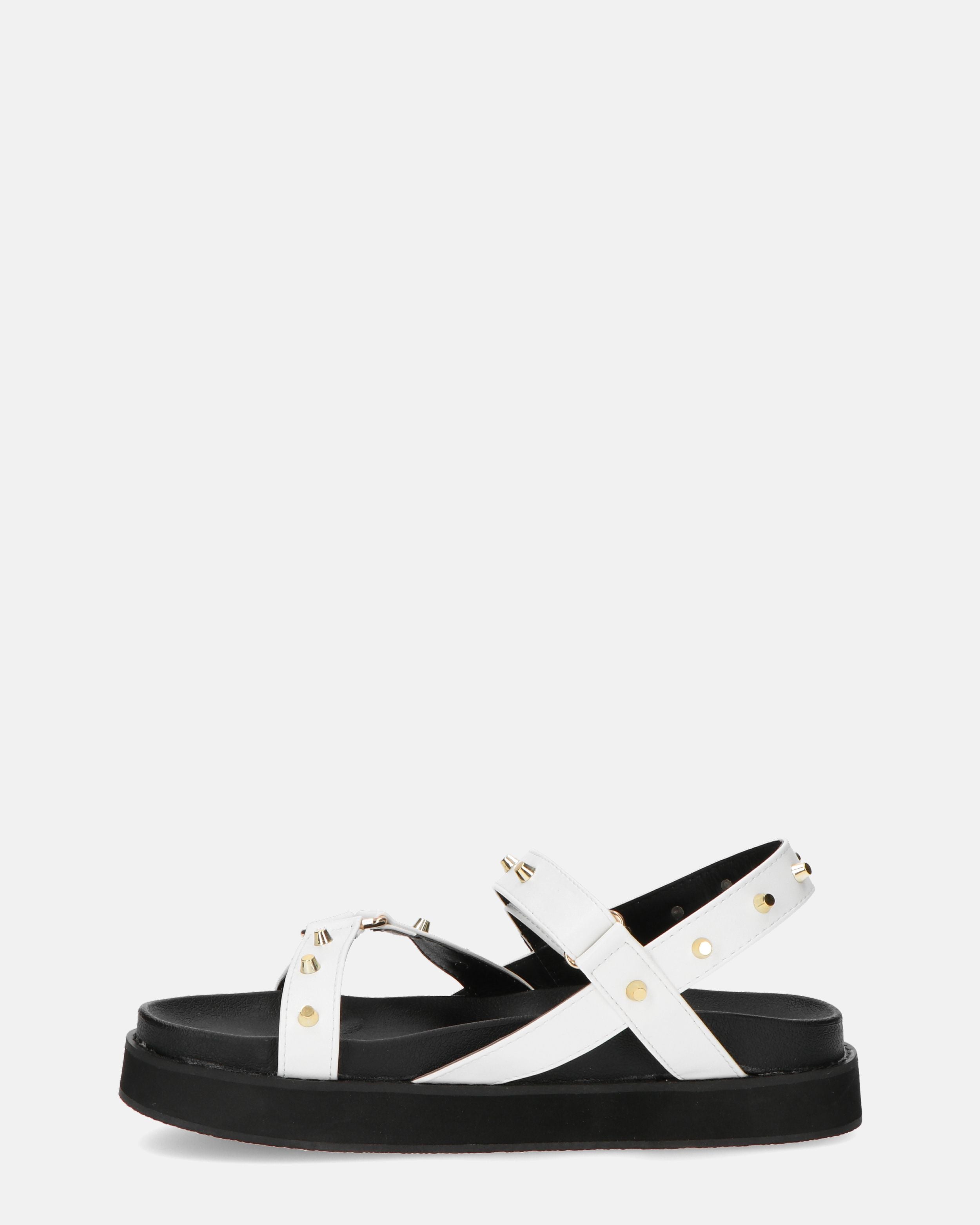 MANON - flat sandal with black leather stripes and gold studs